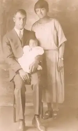 Louise, her husband Charles and their son Louis.