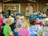 Group of people sitting at tables