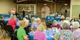 Group of people sitting at tables