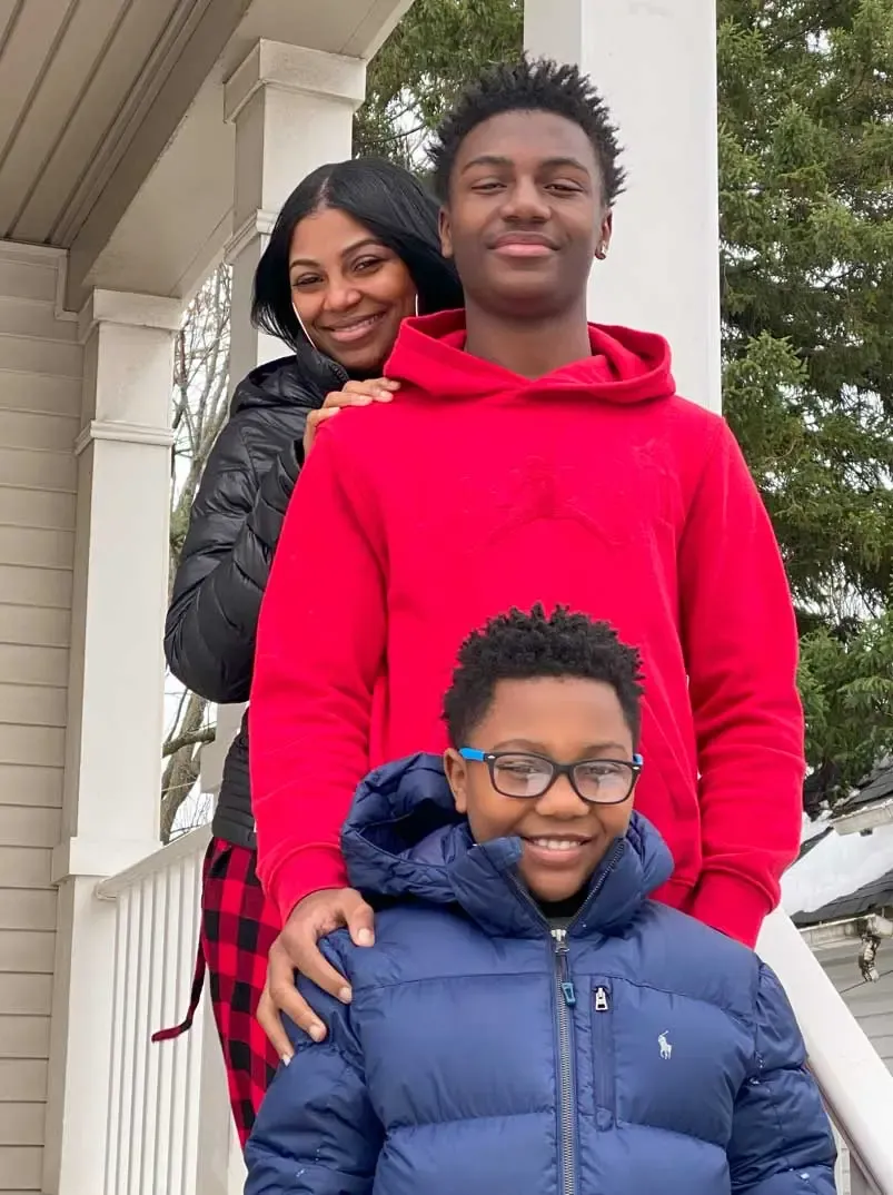 Family on porch steps